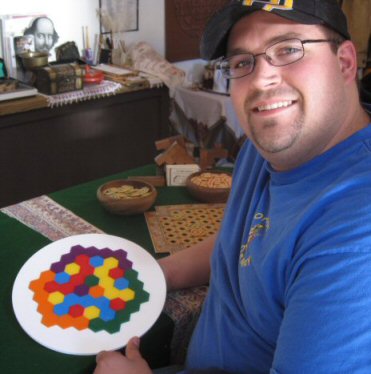 Grown-up skill--sophisticated symmetry with Hexdominoes