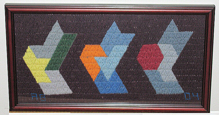 Alton Bader's needlepoint of his Iamond Hex triples solution